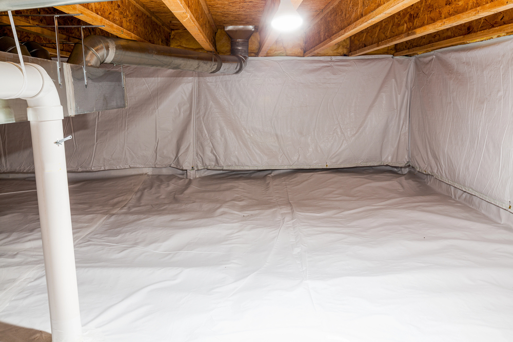 Clean, finished crawl space with white plastic vapor barrier covering the floor and walls, exposed wooden ceiling beams, and visible pipes and ductwork.